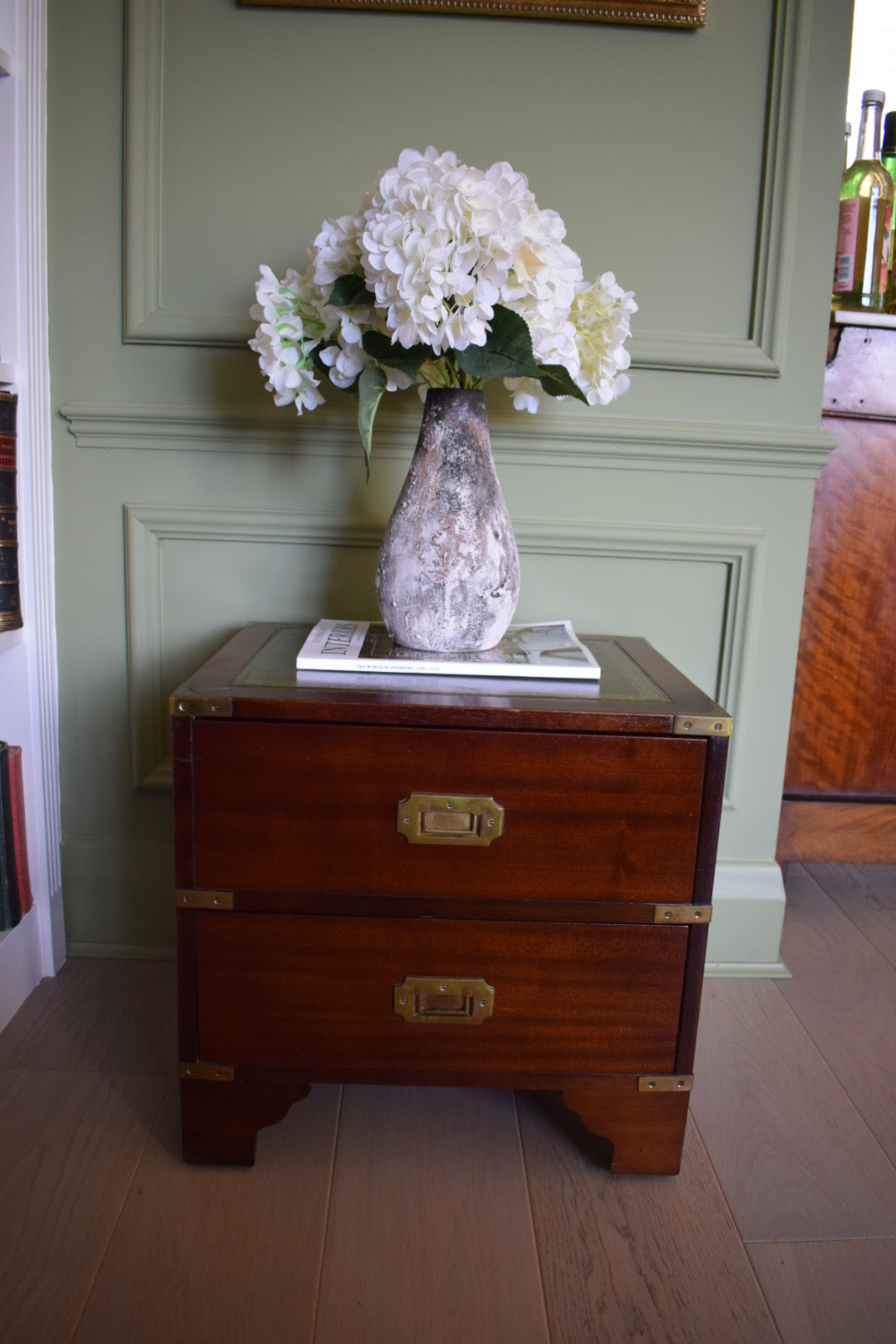 Harrods Kennedy military bedside table with green leather top with handles