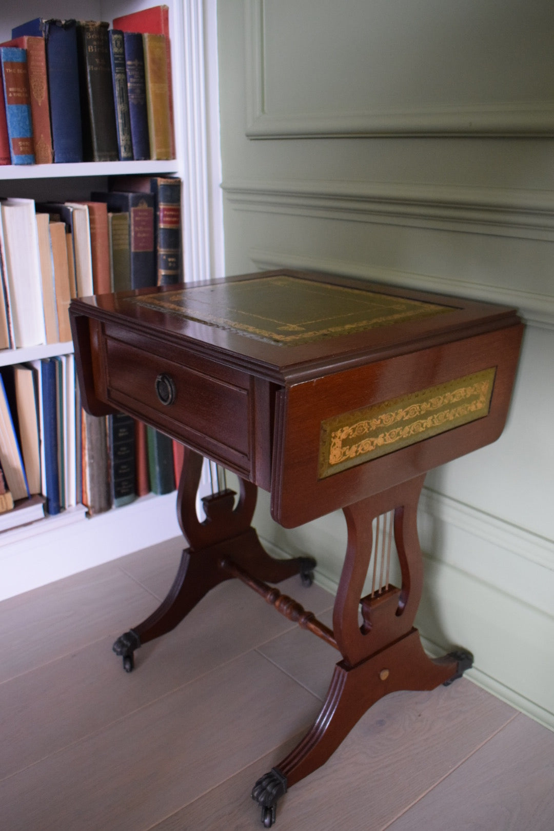 Gorgeous Flamed Mahogany Bedside Or End Wine Tables With green Leather Top on castors