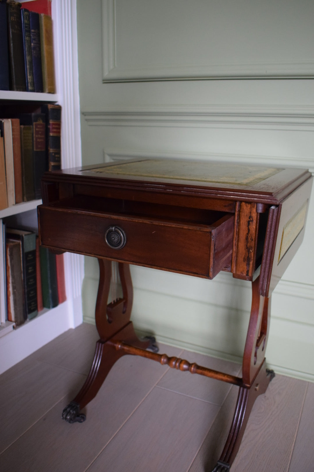 Gorgeous Flamed Mahogany Bedside Or End Wine Tables With green Leather Top on castors