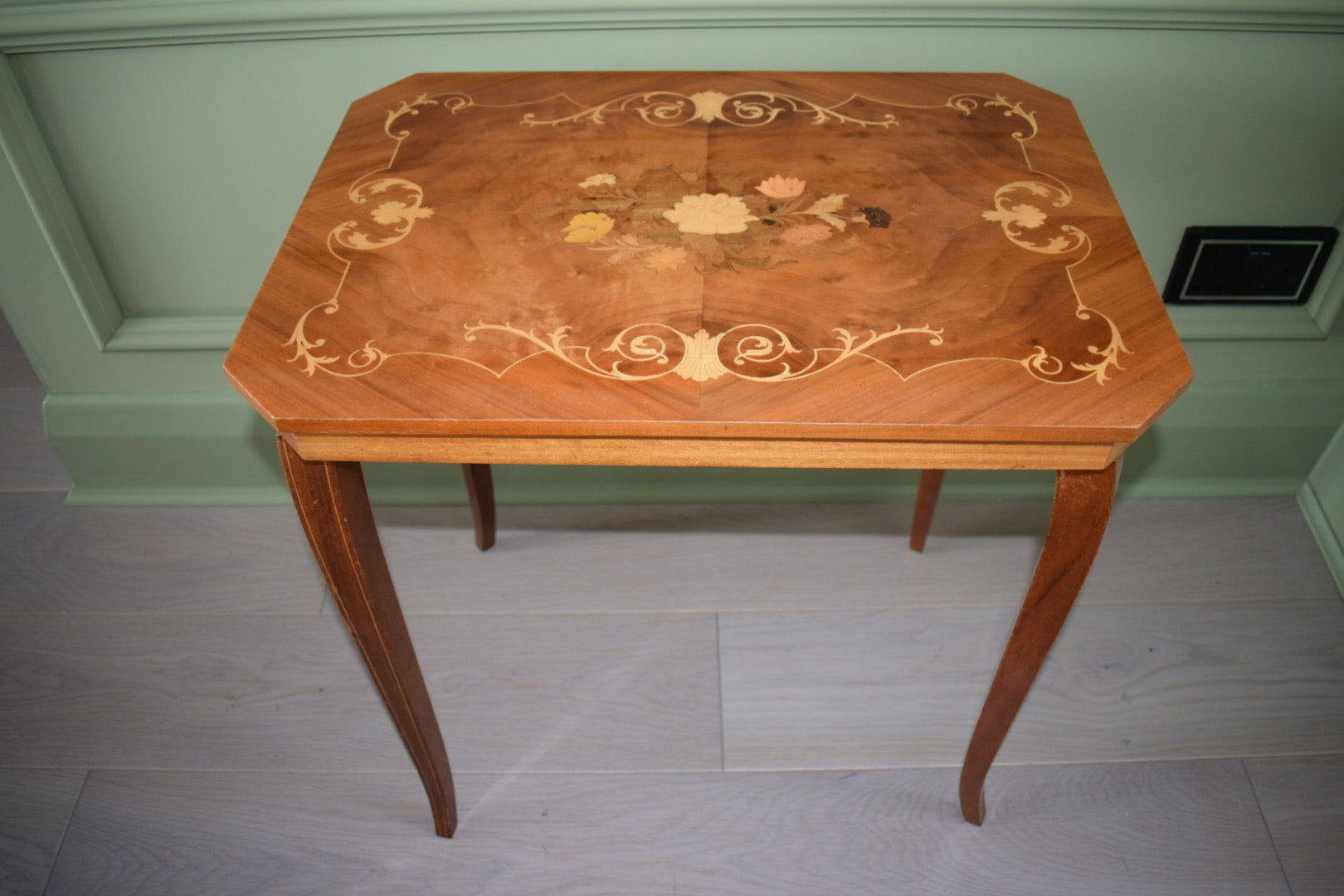 Midcentury Italian Sorrento table with wooden inlay top.