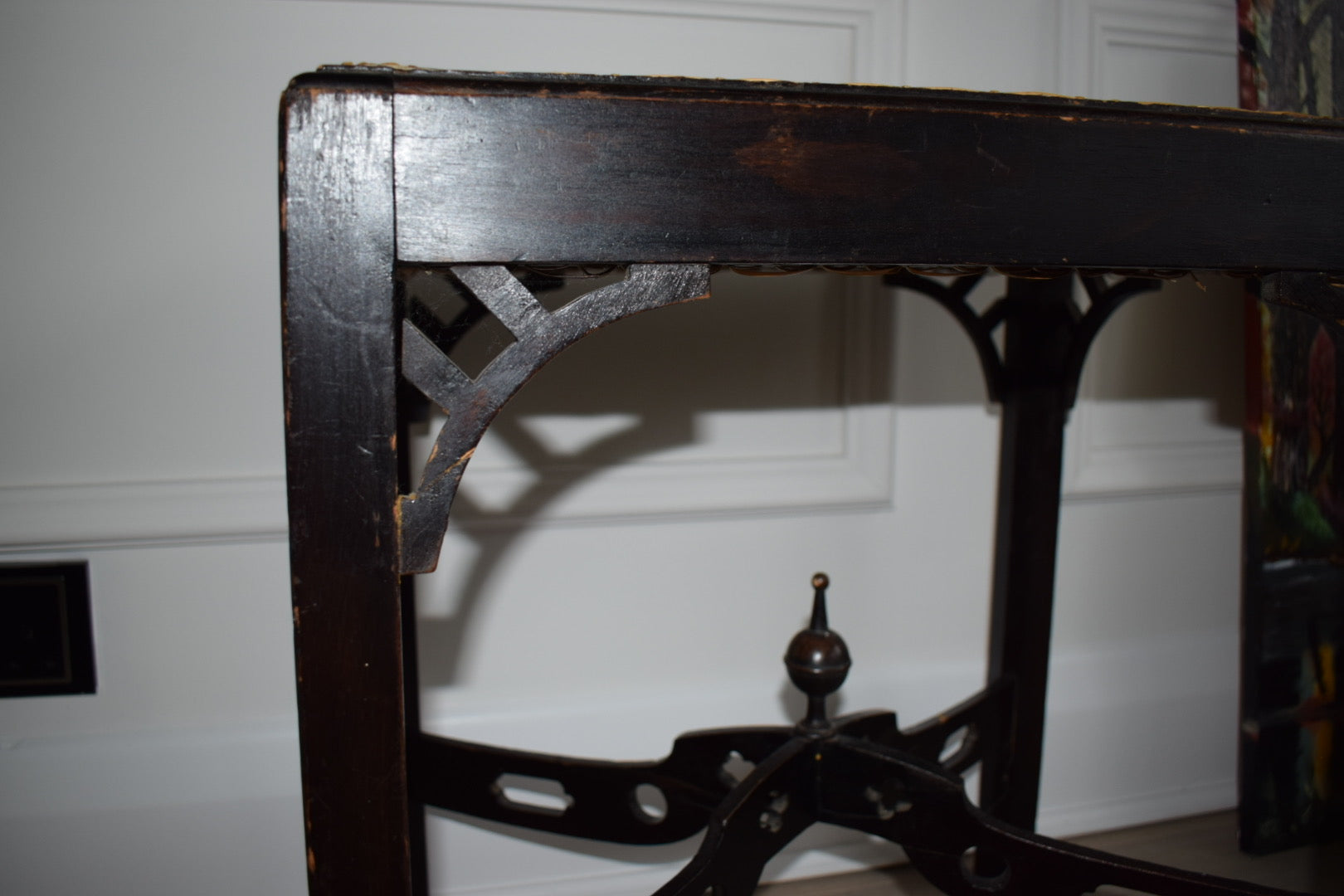 A 1930's Chippendale style stool with woven cane seat