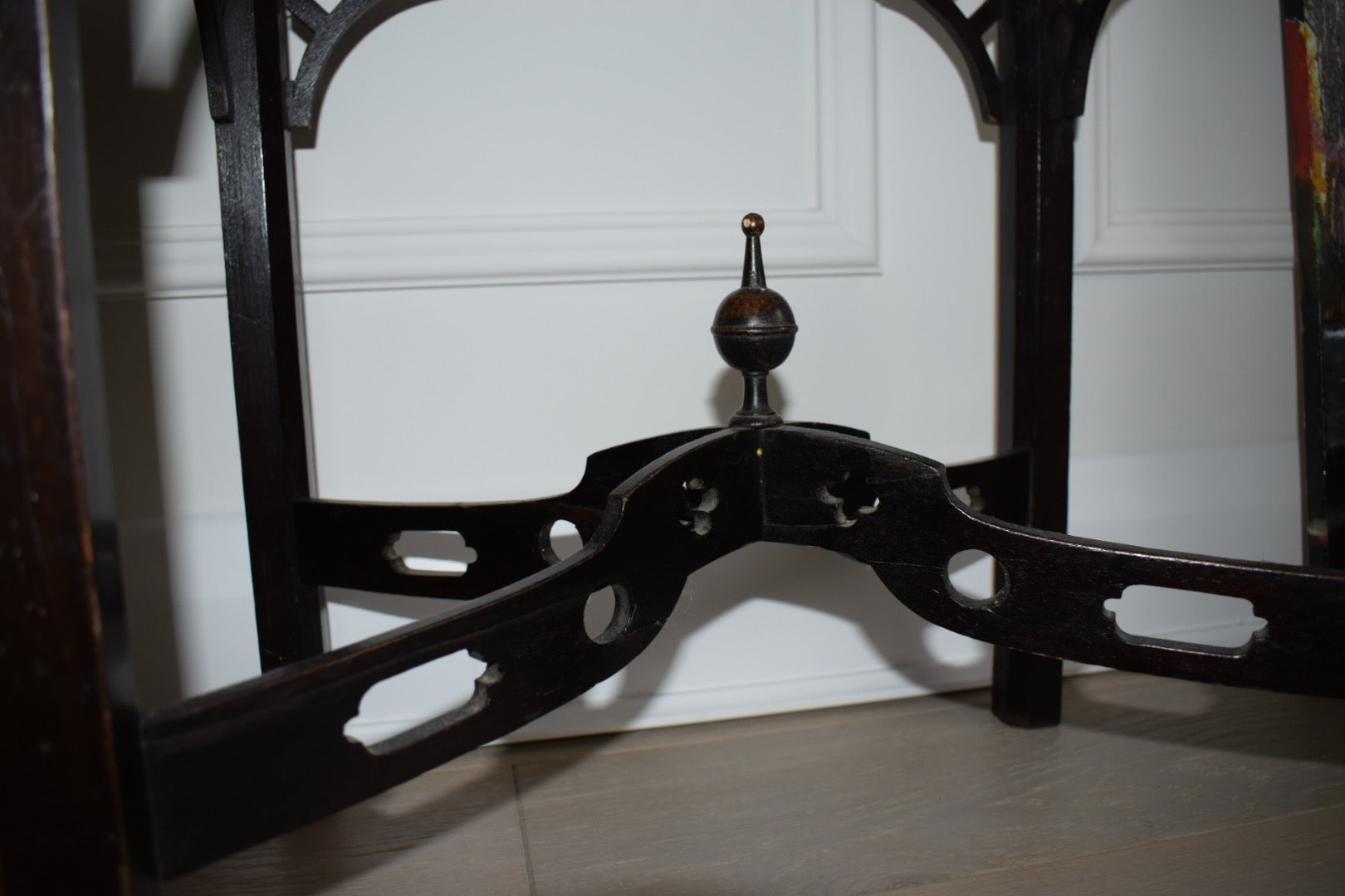 A 1930's Chippendale style stool with woven cane seat